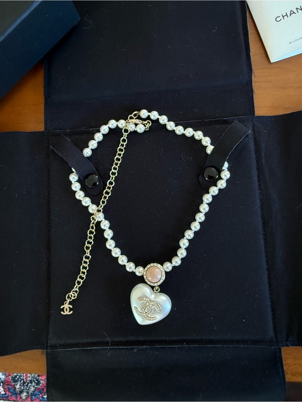 CHANEL Pearl Necklace with Gold Heart Pendant and Pink Accent